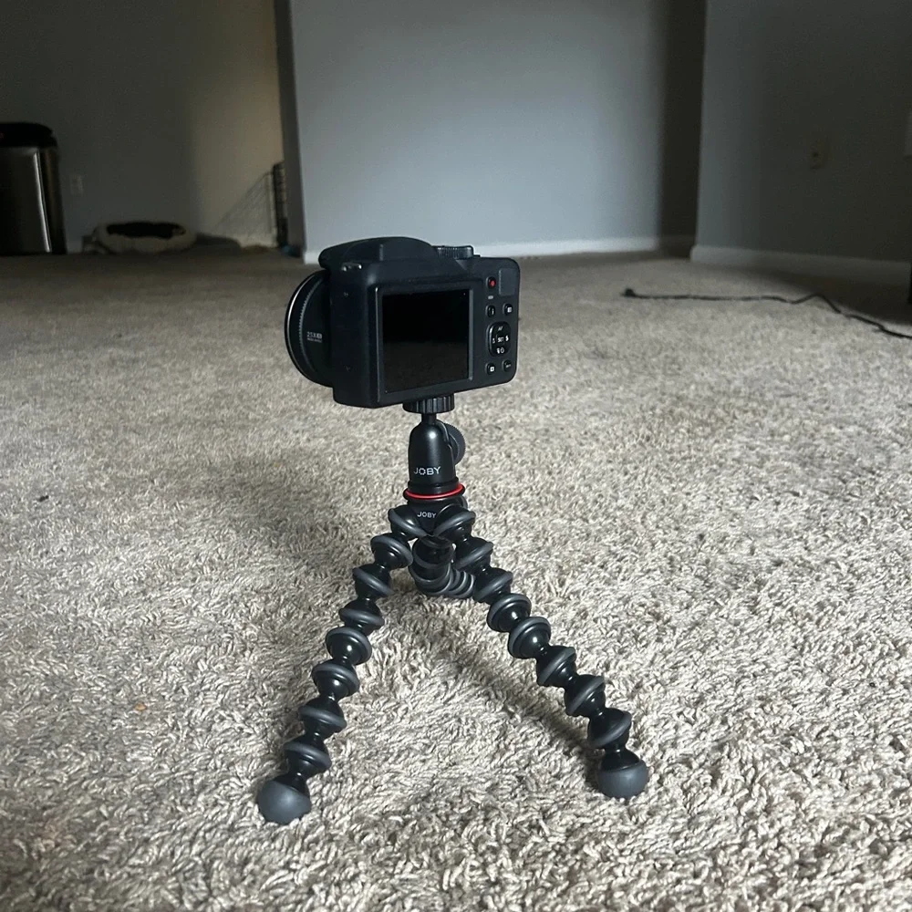 Black Camera with Flexible Tripod